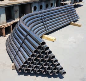A bunch of pipes are stacked on top of each other